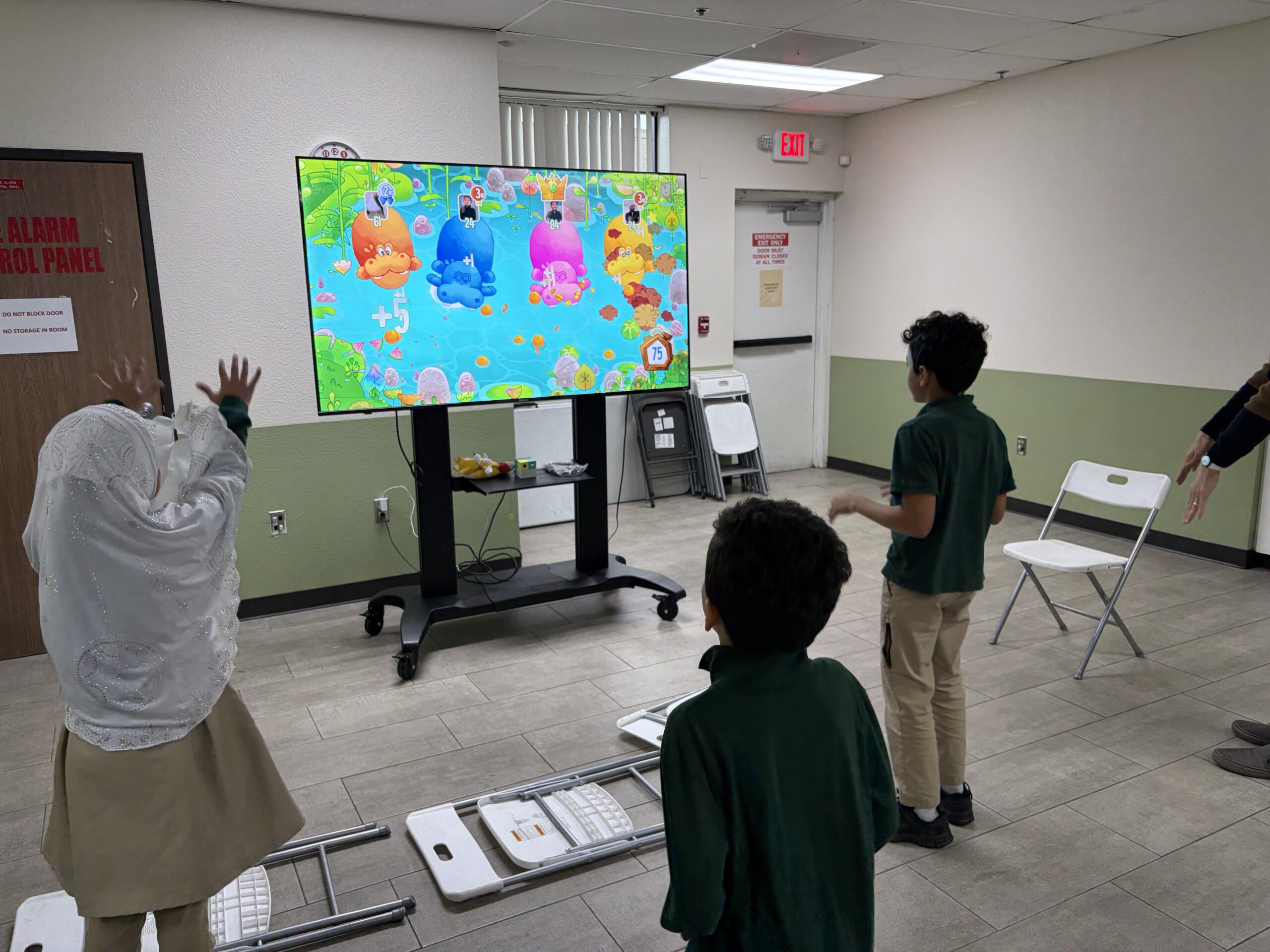 Strive students engaged in interactive learning